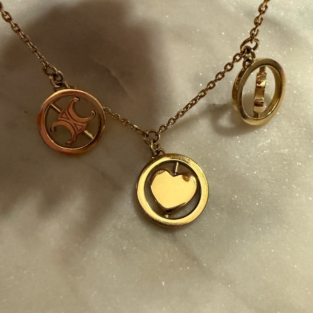 Celine Swivel Multi-Pendant Bracelet - Picture 7 of 11